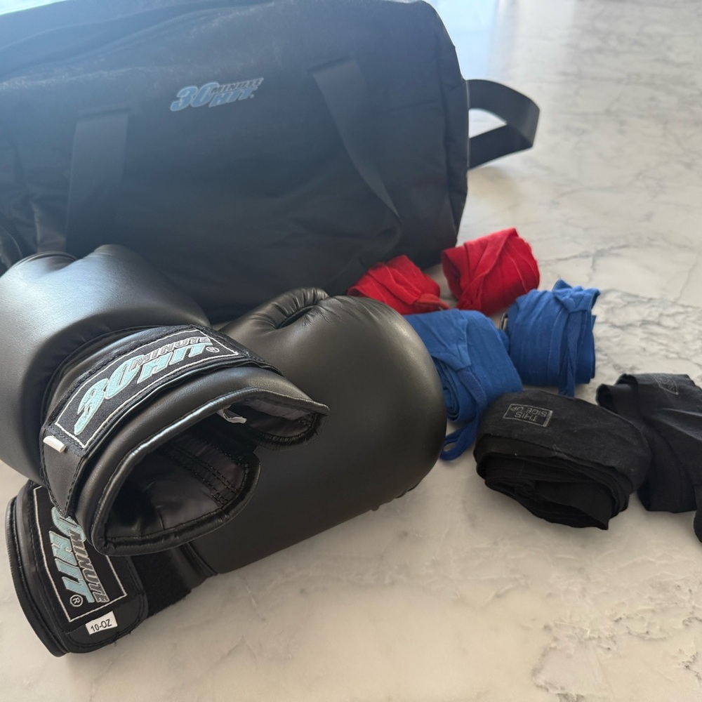 Boxing gloves, wrap bands and Duffel in Black, red and Blue